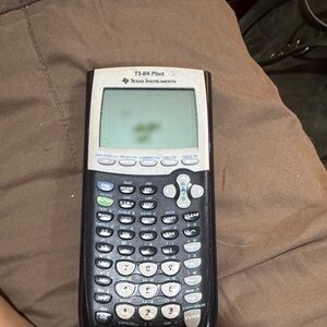 Texas Instruments TI-84 Plus Calculator in Black and Gray